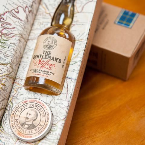 Coffret cadeau cire &agrave; moustache et bouteille de whisky